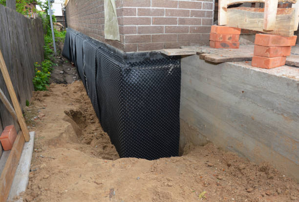 Happy homeowners after waterproofing job in Lithopolis